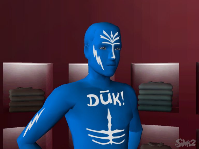 Screenshot of The Sims 2 Body Shop showing a close-up of a Sim. The Sim has bright blue skin and white facial markings, including lightning bolts. They are wearing a blue top featuring the word "DŪK!" in white letters above a white skeletal ribcage design. The background features shelves stacked with folded clothes, and the classic The Sims 2 logo is visible in the bottom right corner.