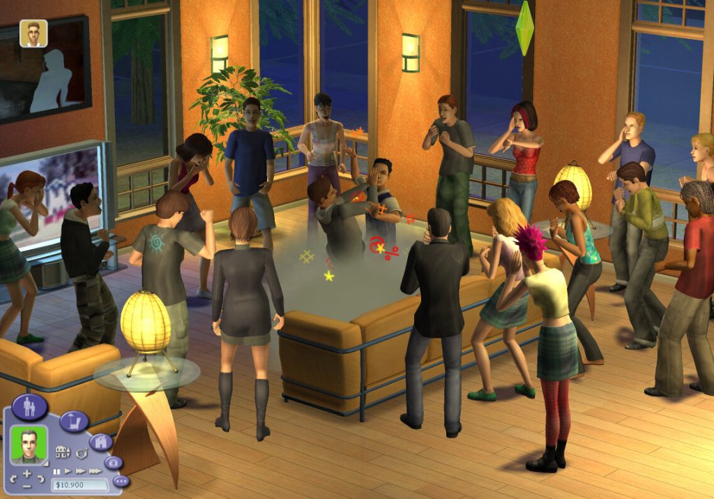 Screenshot of The Sims 2 showing a large group of Sims gathered in a living room for a party at night. In the middle of the room, two Sims are in a physical fight, depicted by a classic cartoon dust cloud with flying stars. The surrounding Sims are watching and reacting to the commotion.