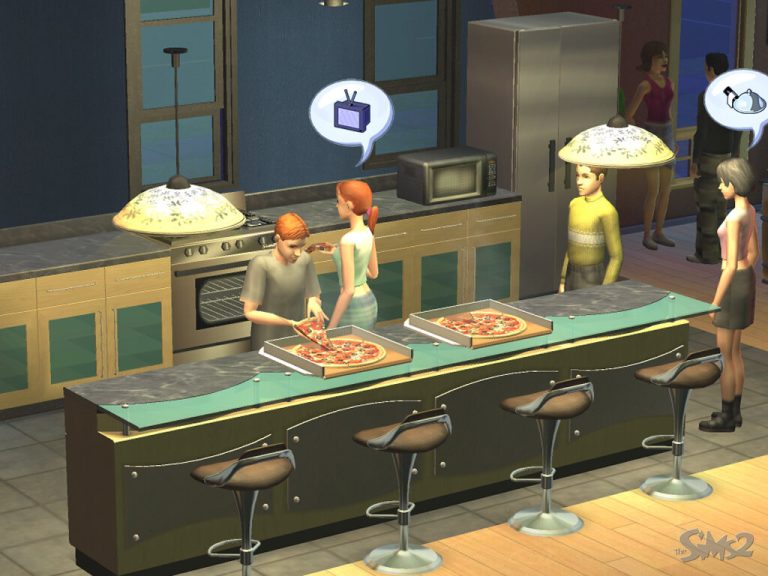 Screenshot of The Sims 2 showing an indoor kitchen scene. Two open pizza boxes are resting on a large green and wood island counter. One Sim is grabbing a slice of pizza, while another Sim stands nearby with a thought bubble displaying a television. Two other Sims are gathered around the kitchen, with one displaying a teapot thought bubble.