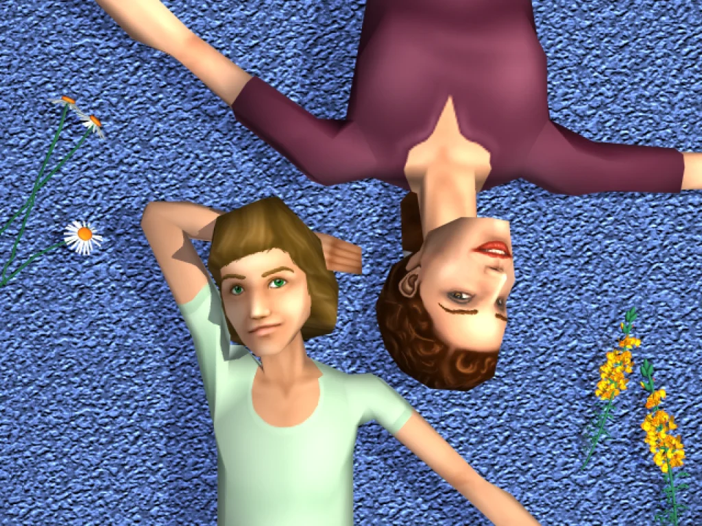 A classic promotional render from the original The Sims game displaying a top-down view of two female Sims lying on their backs on a blue, textured carpet. They are looking directly up at the camera. The Sim on the left has short brown hair and wears a light green top, while the Sim on the right has dark hair pulled back and wears a dark reddish-purple top.